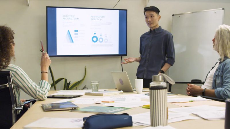 Students presenting data during a class at Stanford Graduate School of Business