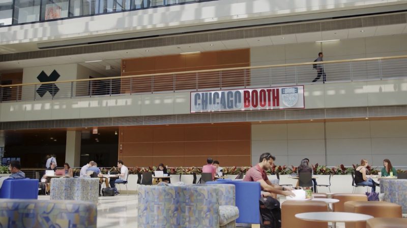 Students studying inside the University of Chicago Booth School of Business building